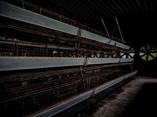 The empty laying cages of poultry houses, old, decayed, abandoned - 761541159