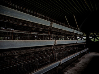 The empty laying cages of poultry houses, old, decayed, abandoned - 761541160