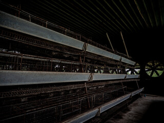 The empty laying cages of poultry houses, old, decayed, abandoned - 761541169