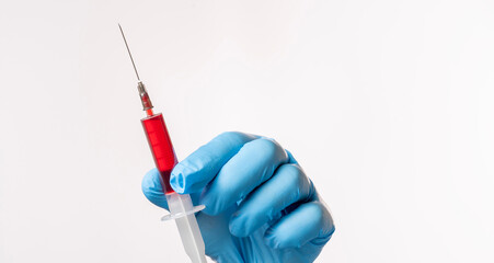 Syringe with blood on white background, insulin test.