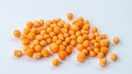 Semarang, Indonesia 5 Feb 2023 - Pilus Garuda branded spicy round snack isolated on a white background.