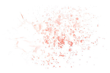 Peach watercolor paint splatter on white background.