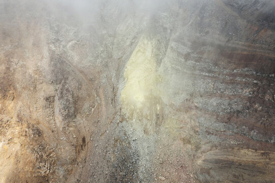 Sulfur yellow rock with toxic smoke - Powered by Adobe