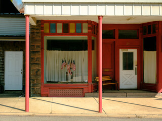 Red facade with American flags in the window, Weatherly, Pennsylvania
