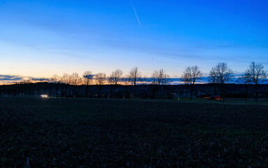 Glowing sunset over the meadows near Straßberg near Augsburg on the edge of the Western Forests...