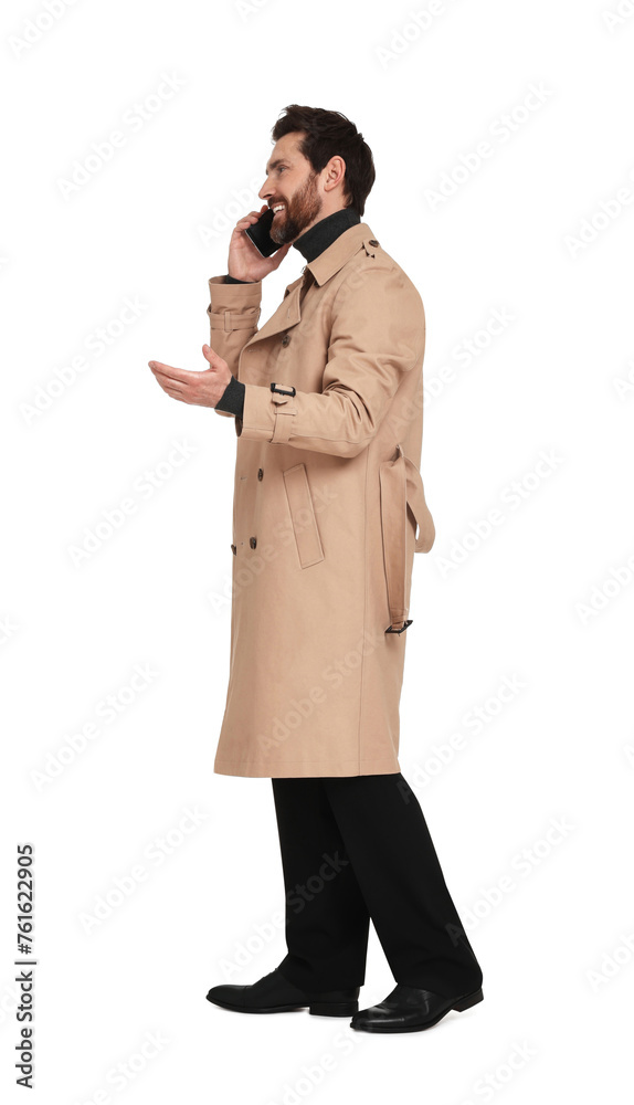 Canvas Prints Handsome man talking on phone against white background