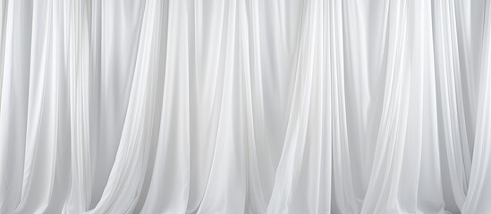 Fototapeta premium A close up of a grey curtain made of transparent material with a subtle wood pattern. The monochrome photography captures the tints and shades beautifully