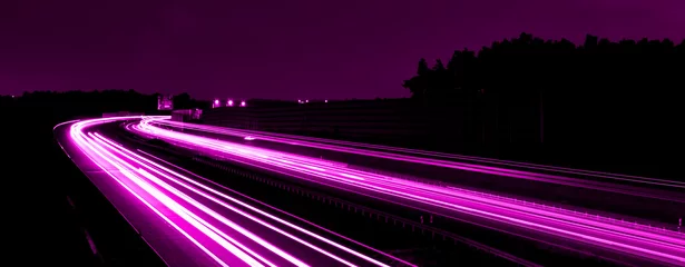 Deurstickers violet car lights at night. long exposure © Krzysztof Bubel
