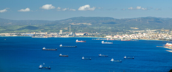 Aerial view. Warships, barges and boats in the sea near the border of Gibraltar, Spain.