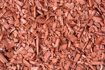 Detail of a surface covered in brown decorative wood chips 