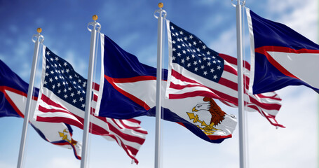 The American Samoa flag waving in the wind on a clear day