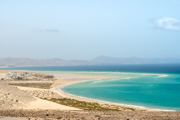 Stunning morning view of the islands of Lobos and Lanzarote seen from Corralejo Beach (Grandes Playas de Corralejo) on Fuerteventura, Canary Islands, Spain,