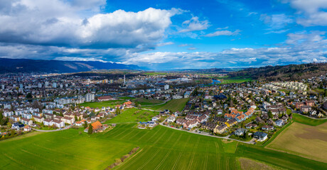 Stadt Biel im Berner Seeland mit Fluss Aare im Hintergrund Luftbild Bern Schweiz - obrazy, fototapety, plakaty