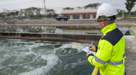 Environmental engineers work at wastewater treatment plants,Water supply engineering working at Water recycling plant for reuse