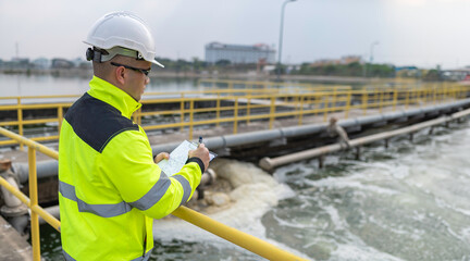 Environmental engineers work at wastewater treatment plants,Water supply engineering working at...