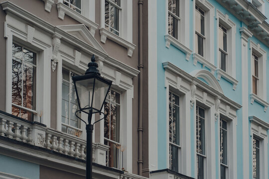 Pastel coloured terraced houses in Primrose Hill, London, UK.