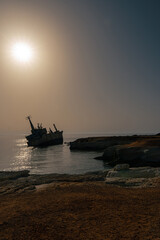 Remains of a shipwrecked vessel off the rocky shores of Paphos, Cyprus