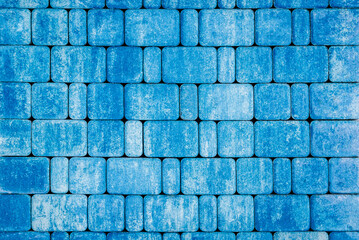 A vibrant cobalt blue concrete pavement tile, perfect for adding a pop of color to any outdoor...