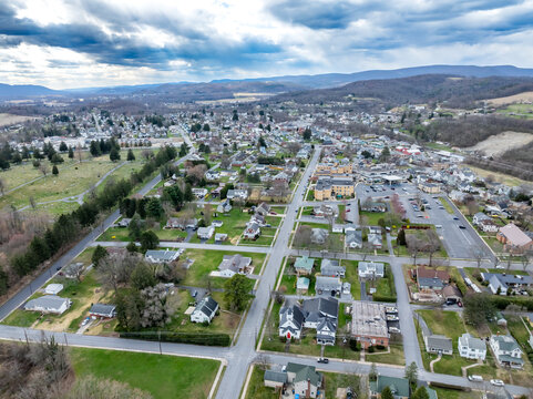 Jersey Shore, PA, USA - 03-17-2024 - Cloudy winter, spring aerial image of the borough, downtown area of Jersey Shore, Pennsylvania. 