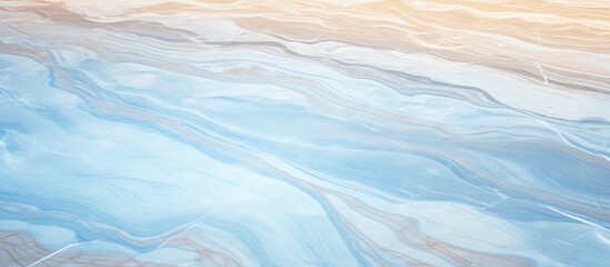 Fototapeta premium A detailed closeup of a blue and white marble texture resembling water ripples, capturing the fluid motion of wind waves. This stunning pattern could be compared to a painting in an art landscape
