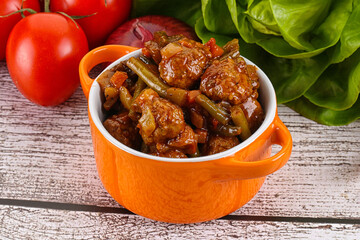 Meatball with vegetables and spices