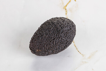 Fototapeta premium Ripe raw whole avocado fruit