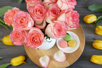 table with flowers and sweet breakfast, happy mother's day, happy birthday,