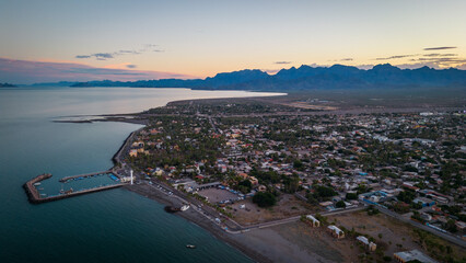 drone fly above Loreto Baja California Sur Mexico old colonial town with sea gulf ocean and...
