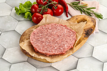 Raw beef uncooked burger cutlet
