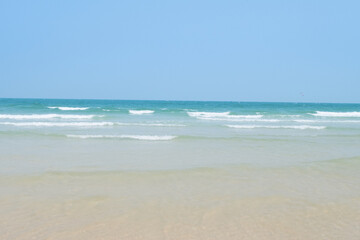 Fototapeta na wymiar Beautiful tropical beach with white sand and blue sky.