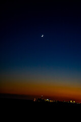Sunset, Moon and Evening Sky over Maspalomas on Gran Canary Island Spain.