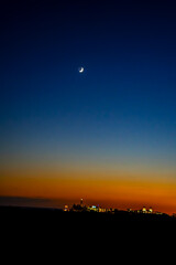 Sunset, Moon and Evening Sky over Maspalomas on Gran Canary Island Spain.