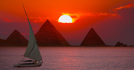 Beautiful Nile scenery with sailboat in the Nile on the way to Giza Pyramids, Egypt