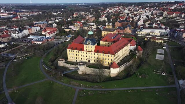 Telephoto shot of Moritzburg Castle in Zeitz. Slow flight towards the castle. Beautifully lit just before sunset. Jewel in Saxony-Anhalt.