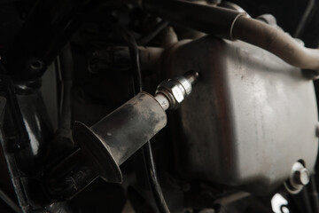 Spark Plug Inspection and Maintenance, Inspection Prior to Installation in engine ignition and electrical systems at motorcycle garage.repair and maintenance motorcycle concept.