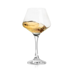White wine splashing in glass on white background