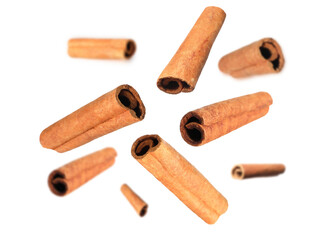 Aromatic dry cinnamon sticks on white background