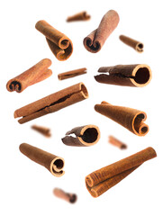 Aromatic dry cinnamon sticks on white background