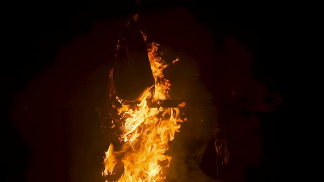 Burning an effigy of the victim at the stake.Witch rituals,Halloween.Burning witches in the dark is a religious tradition.A nightmare,horror.The mystery of evil,magic and mysticism.Esoteric sacrifice