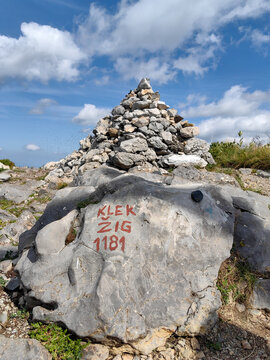 Mountain peak Klek and mountain mark. Klek is mountain in north-western Croatia, near Ogulin in Karlovac County. It is the easternmost mountain of the Velika Kapela range of the Dinaric Alps.