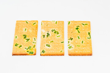 Chive biscuits on white background