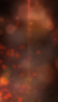 Vertical Sparks and Lights Fire Background 4K Loop features orange and red sparks, smoke, and spherical lights floating across the screen against a dark background in a vertical ratio loop.