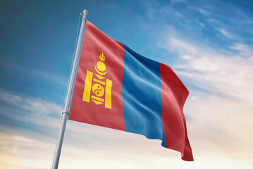 Waving flag of Mongolia in blue sky. Mongolia flag for independence day. The symbol of the state on wavy fabric.