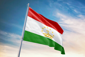 Waving flag of Tajikistan in blue sky. Tajikistan flag for independence day. The symbol of the state on wavy fabric.