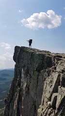 one hiker stands on summit of Borestone Mountain