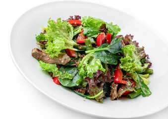 Healthy salad with grilled beef meat, tomatoes, bell pepper, lettuce, arugula, french bean and sauce in plate isolated on white background. Healthy food, top view