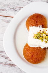 Closeup of Delicious Kemalpasha, Traditional Turkish Desserts Served on a White Plate