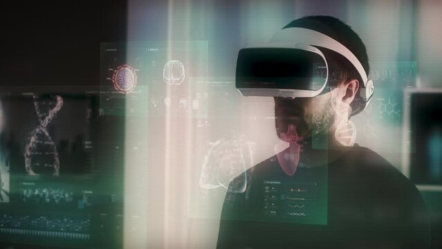Caucasian Businessman Using futuristic VR Glasses. Medical Animations appearing: MRI, DNA, Brain, Heart and Cell Animations. Augmented Reality Headset, Metaverse. All content included in my portfolio.