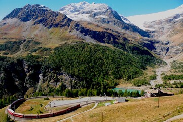 Die Bernina-Bahn fährt zur Alp Grüm. The Bernina Railway driving to the Alp Grüm