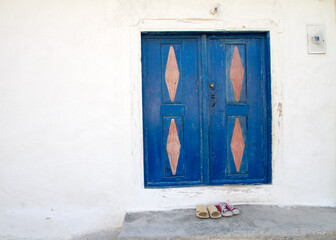 Unnumbered Blue Door